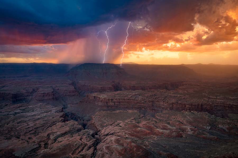 This spot on the North Rim of the Grand Canyon was difficult to get out to, but the views were sure worth it  as you could shoot in just about every direction!  At sunset, several storms were moving through and it was tough to decide which one to concentrate on.  This is a single shot image using my lightning trigger at 1/4sec shutter speed. The sound of the booming thunder all around me was an experience I won't soon forget. Within a few minutes of taking this shot, the rain began to fall in earnest.  Even though I was completely soaked, I was grinning from ear to ear.  What a magical evening.  I'll have lots more to share from this night.