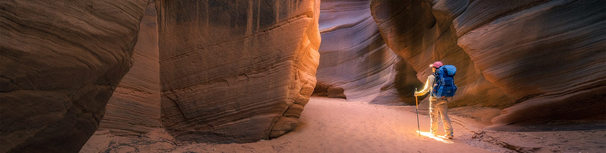 One thing I love about slot canyons is that the light is always changing, depending on the time of year and time of day you visit. And in photography, it really is all about the light!  On this hike, we were mesmerized for hours by the undulating swirls and textures of the sandstone slot. When we rounded a bend a saw this one small beam of light entering the canyon, I hurried and setup my gear and captured Evelyn before the light disappeared.  This is a single exposure image taken from a tripod.  I used ISO 800 to get a short enough shutter speed to render Evelyn sharp.