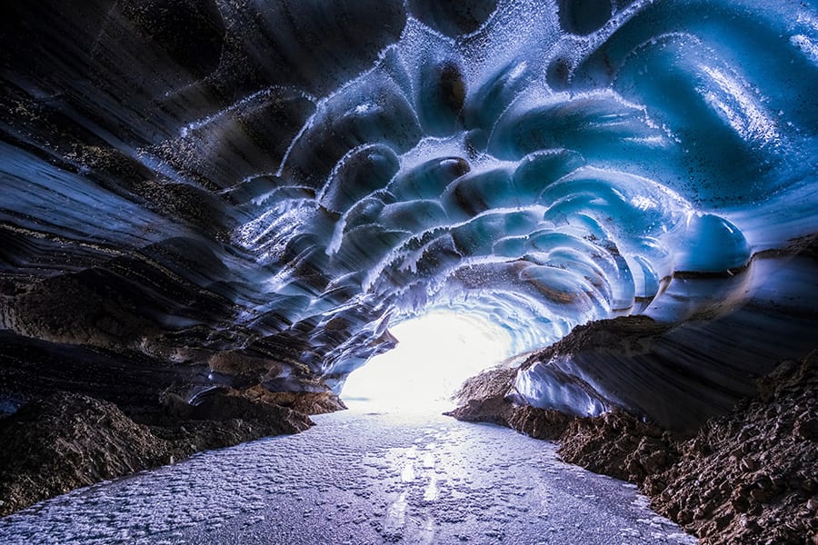 Castner Glacier ice cave in the Alaska Range; Alaska, United States of ...