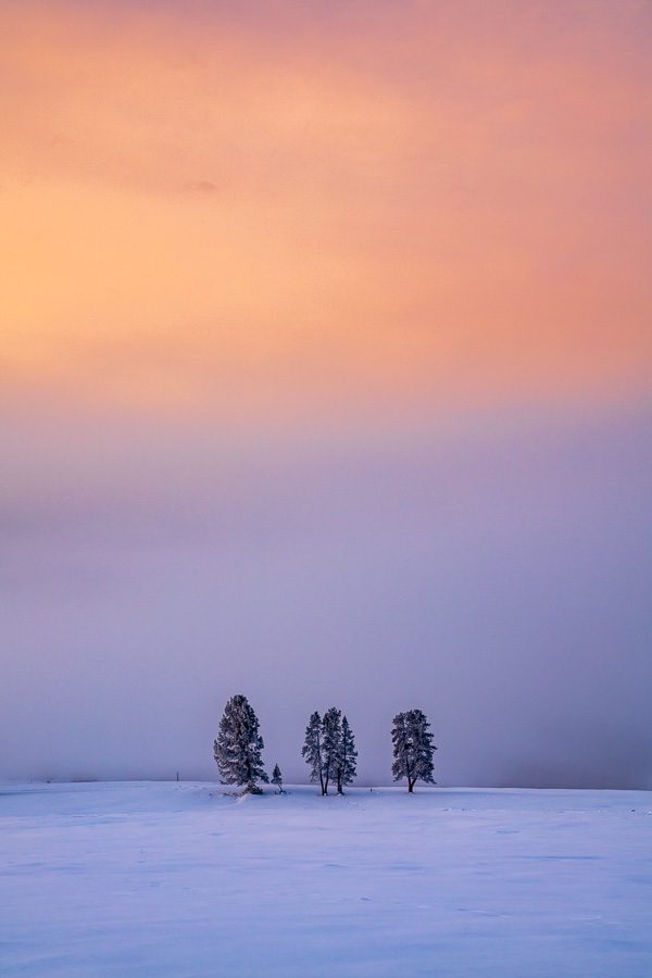 As a photographer, I find myself gravitating more towards minimalism in my style.  Yes, I still love the grand, intricate landscape.  But there is something almost more gratifying to simple scenes, such as this sunrise we captured on our recent Yellowstone Workshop.